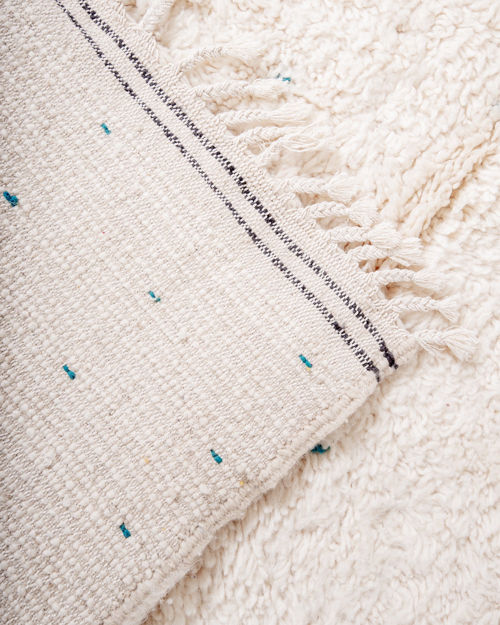 Modern, designer, handcrafted Berber rug from Morocco. Beniourain carpet with beautiful colours and patterns and fluffy wool texture.